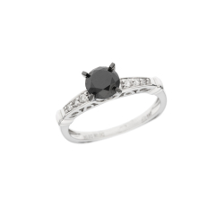 Prsten z bílého zlata s černým a bílými diamanty. Hranatý tvar