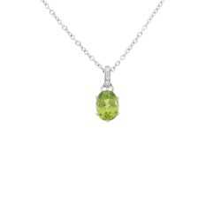 Přívěsek z bílého zlata s peridotem a diamanty. Délka 44,5cm