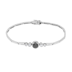 Náramek z bílého zlata s černým a bílými diamanty. Délka 17cm