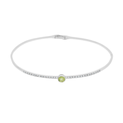 Náramek z bílého zlata s peridotem a diamanty. Pevný ovál se zapínáním