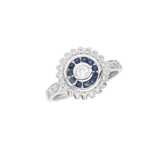 detail Prsten z bílého zlata se safíry a diamanty