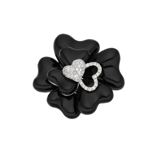 detail Brož z bílého zlata s onyxem a diamanty a možností zavěsit .Průměr 3,50cm